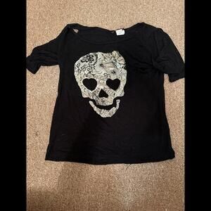 Unleash Your Inner Rebel w/ this Stylish Women's Skull T-Shirt from Joyce Leslie